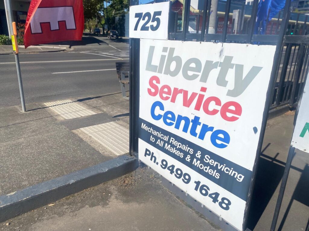 Liberty Service Centre street sign at 725 Heidelberg Rd, Alphington
