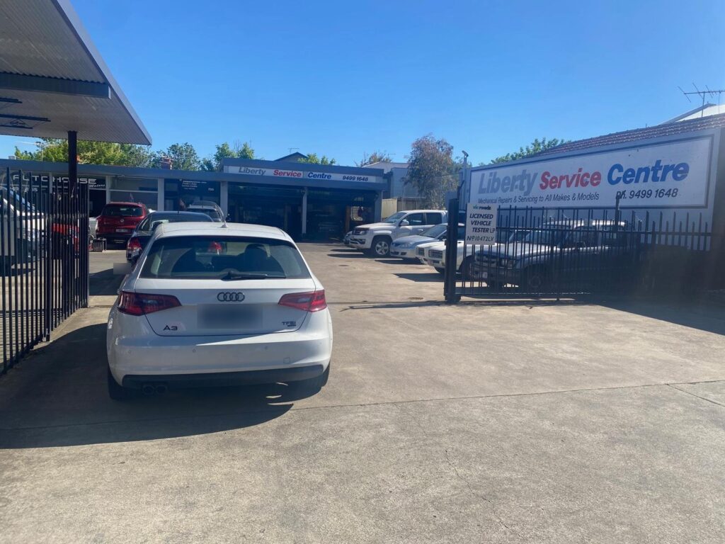 Liberty Service Centre driveway with the VicRoads Licensed Vehicle Tester sign