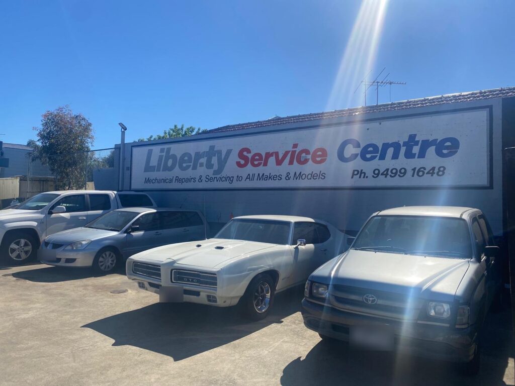 Liberty Service Centre sign above the yard at 725 Heidelberg Rd, Alphington