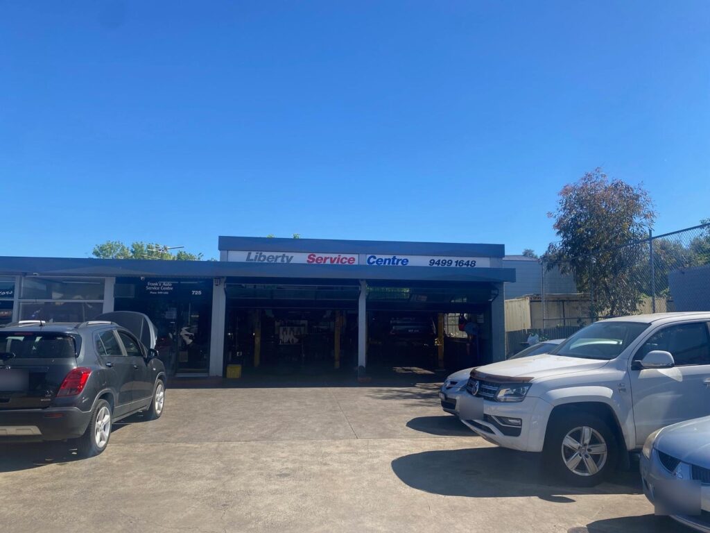 Liberty Service Centre workshop with open service bays in Alphington